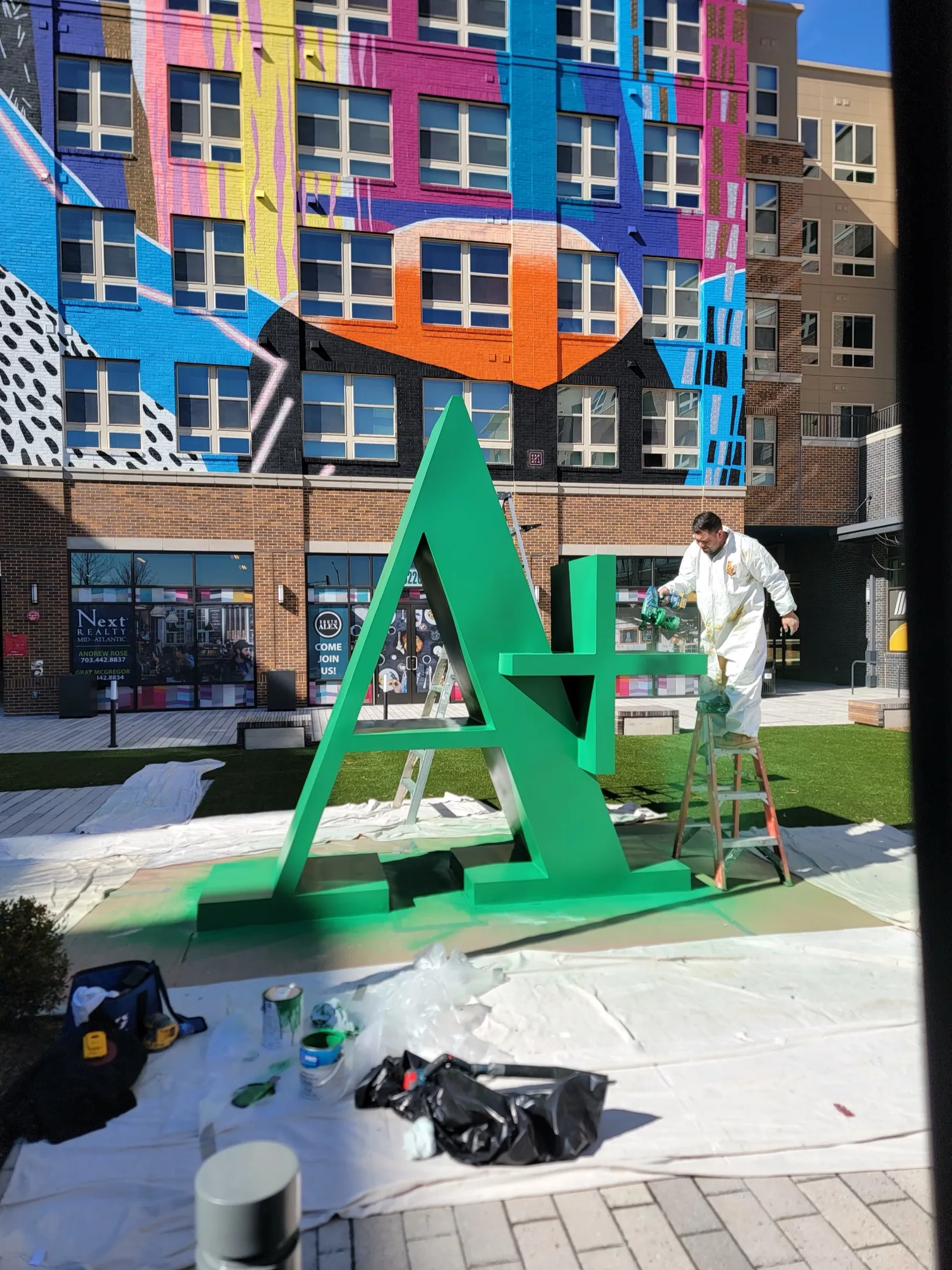 Commercial letter sign repainted at an apartment building
