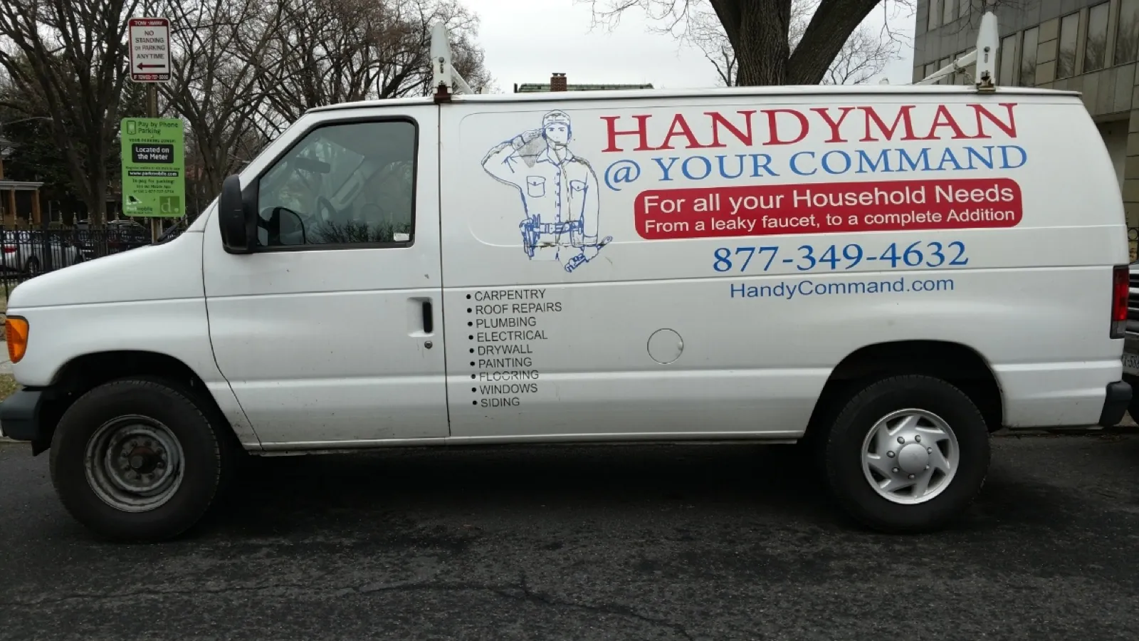Handyman At Your Command service van parked at a job in Maryland