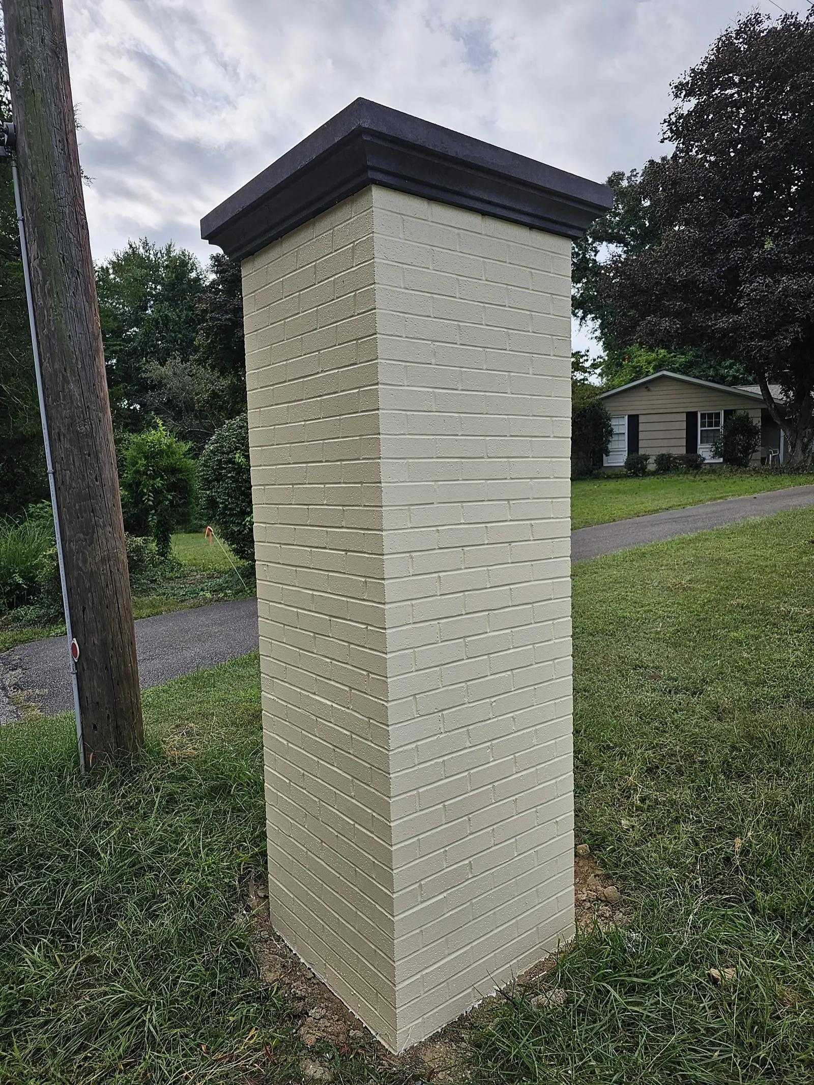 Chimney re-sided with new panels